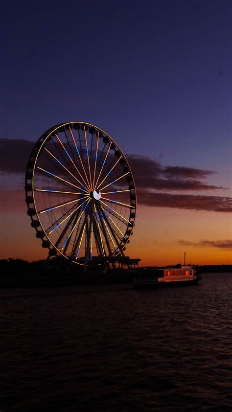 Ferris wheel at sunset - backiee