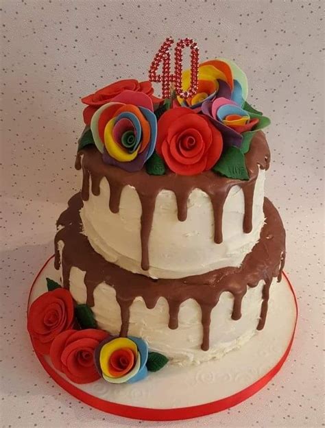 Pin by Carol Wilson on Rainbow roses wedding cake | Wedding cake roses, Rose cake, Wedding cakes