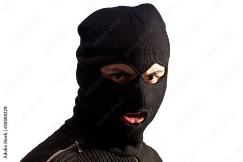 Thief wearing ski mask isolated on white Stock Photo | Adobe Stock