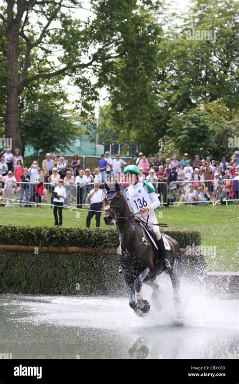 Kathryn Robinson of Canada at the water jump during the cross country ...