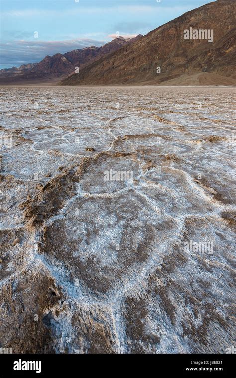 The iconic landscape of Badwater Basin, lowest elevation in the western hemisphere, during ...