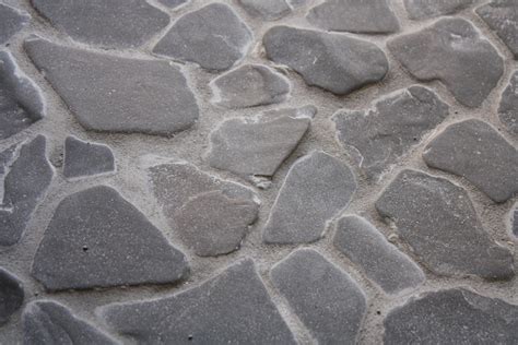 Grouting a DIY beach stone floor | merrypad