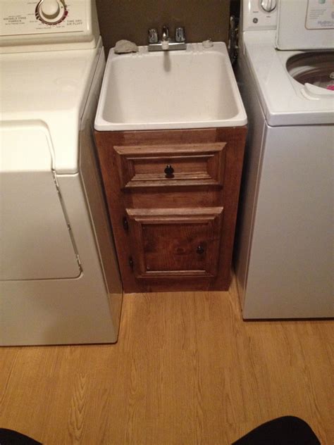 Built a cabinet around a utility sink | Laundry room sink, Laundry room ...