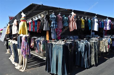 Clothes for Sale at Flea Market — Stock Photo © slickspics #11081888