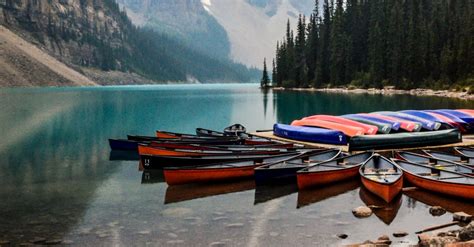 Canoes Docked on Moraine Lake · Free Stock Photo