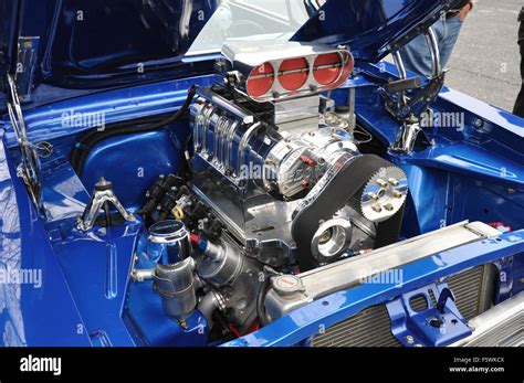 A Custom Supercharged Engine at a car show Stock Photo - Alamy