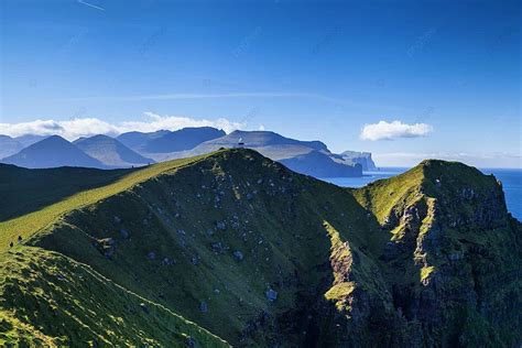 Hiking On The Kallur Lighthouse Trail In Kalsoy Island Faroe Islands ...