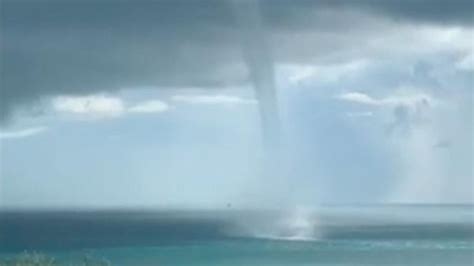 Rare waterspout captured on camera off the Isle of Wight | Weather News | Sky News