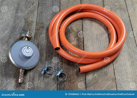 Regulator for Propane-butane Gas Cylinder and Accessories on a W Stock Photo - Image of filling ...