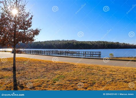 A Majestic Shot of the Still Blue Lake Waters of Lake McIntosh in ...