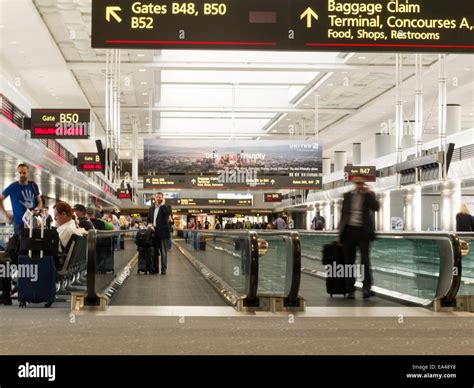 Airport Travelers, Moving Sidewalks and Gates, United Terminal, Denver International Airport, CO ...