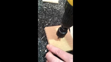 How to drill a hole in cardboard. - YouTube