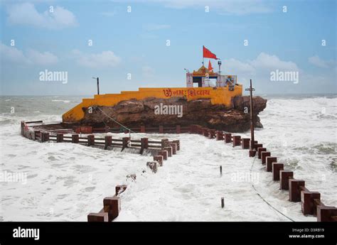 Bhadkeshwar Temple at Dwarka Beach, Dwarka, Gujarat, India Stock Photo - Alamy