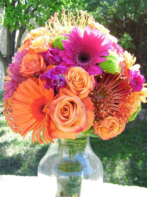 Bright and colorful bridal bouquet created by Lexington Floral in Shoreview, MN. #wedding # ...