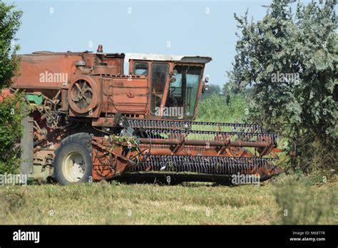 Old rusty combine harvester. Combine harvesters Agricultural machinery. The machine for ...