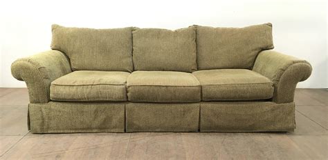 Lot - Traditional Skirted Chenille Rolled Arm Sofa