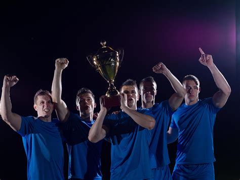 soccer players celebrating victory 11630399 Stock Photo at Vecteezy