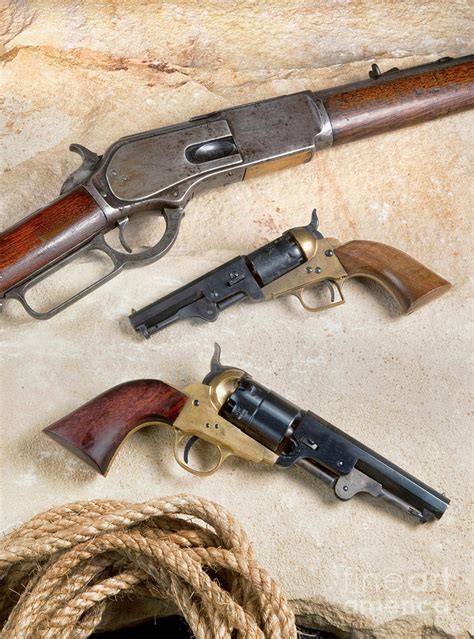 Old Cowboy Guns. Photograph by W Scott McGill - Pixels