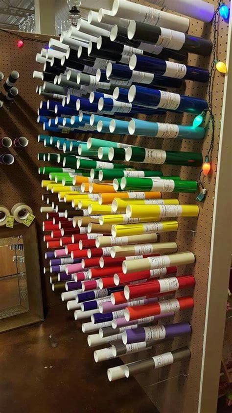 A way to organize vinyl rolls. | Craft room organization, Craft room, Craft room organization diy