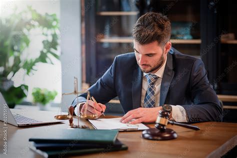 Lawyer or attorney working in the office Stock Photo | Adobe Stock