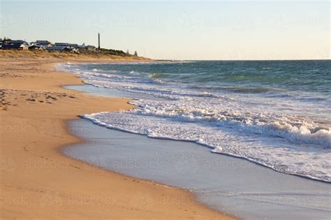 Image of beach at Bunbury looking towards lighthouse - Austockphoto