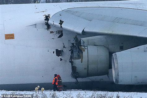 Huge Antonov cargo plane crash lands and skids off the runway in emergency caught on video in ...