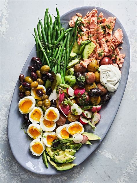 Salmon Niçoise Salad with Garlic-Herb Dressing | Salmon nicoise salad, Anchovy recipes, Nicoise ...