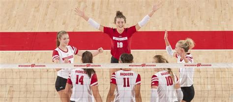 The Badger volleyball team celebrates on the floor | Volleyball team ...