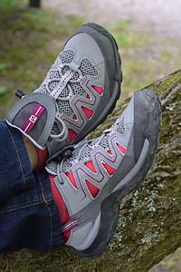 Royalty-Free photo: Shallow focus photography of gray low-top sneakers | PickPik