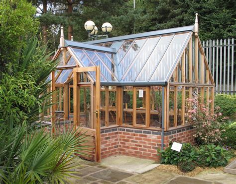 A Gabriel Ash, traditional Victorian style timber greenhouse with dwarf brick wall. Order one ...