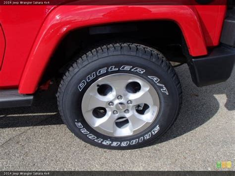 2014 Jeep Wrangler Sahara 4x4 Wheel and Tire Photo #87237921 | GTCarLot.com