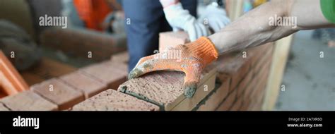 Muscular construction worker Stock Photo - Alamy