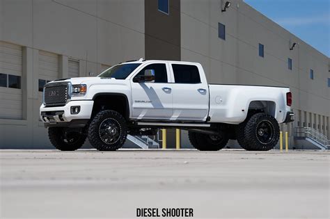 White Stylish GMC Sierra on Contrasting Custom Wheels — CARiD.com Gallery