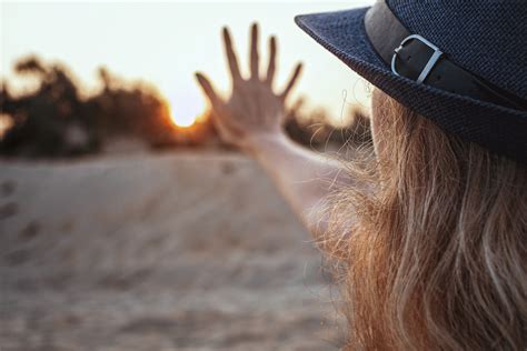 Free Images : hand, beach, sand, girl, sun, sunset, morning, dawn, fur, hat, blonde, close up ...