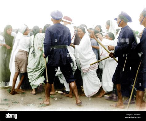 Policemen controlling demonstrators during the Salt Satyagraha, Bombay, India, 1930, old vintage ...