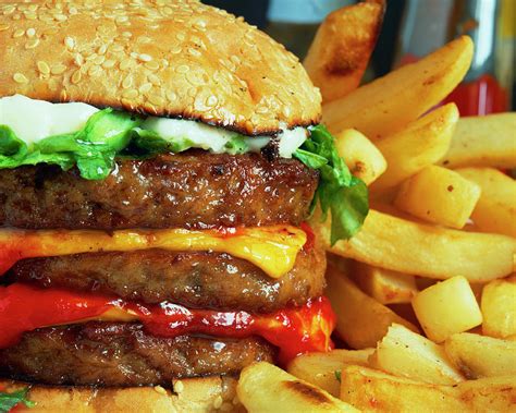 Cheeseburger And Chips Photograph by Martin Bond/science Photo Library