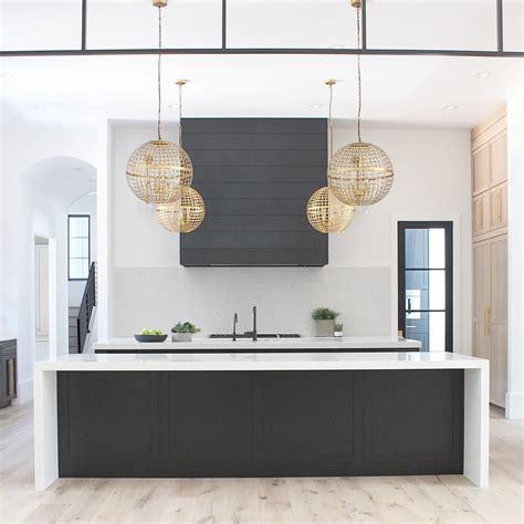 Black kitchen cabinets with gold details. @houseofsilverlining | Home design decor, Black ...