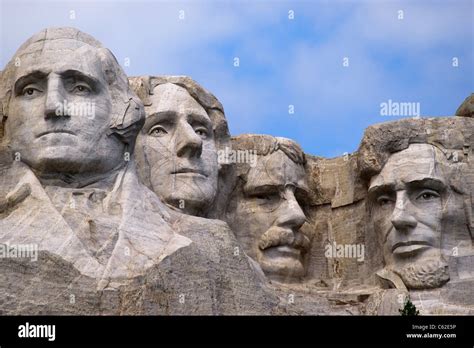 Heads of four American presidents carved in Mount Rushmore in Black ...