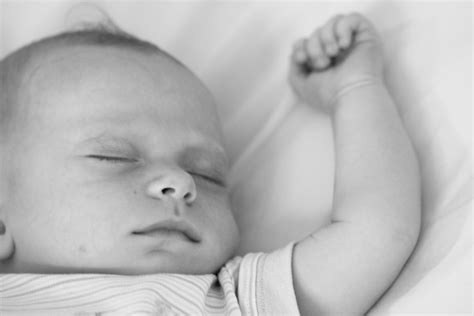 File:Sleeping baby with arm extended.jpg - Wikimedia Commons
