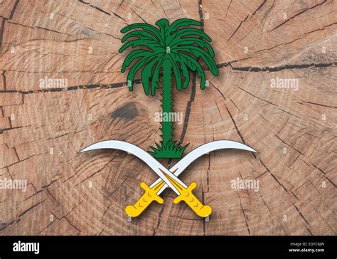 Coat of arms of Saudi Arabia, wooden background Stock Photo - Alamy