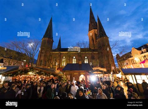 Oldenburg, Germany. 28th Nov, 2017. Visitors stand in front of the St Stock Photo: 166635069 - Alamy