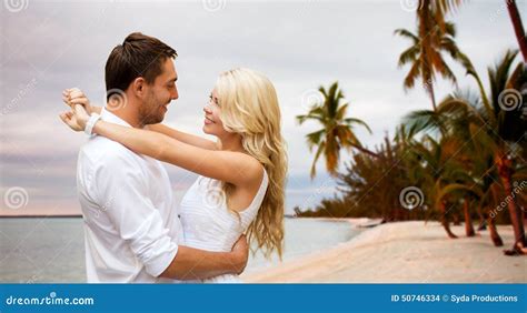 Happy Couple Hugging Over Beach Background Stock Photo - Image of sand ...