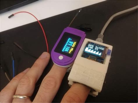 Comparison between a home-made pulse oximeter against a certified one ...