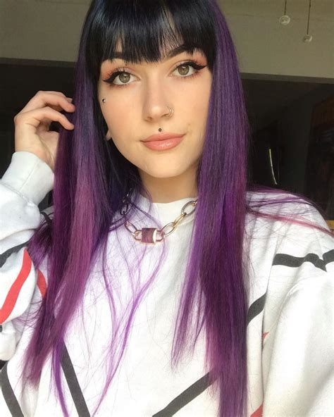 Black hair with purple bangs