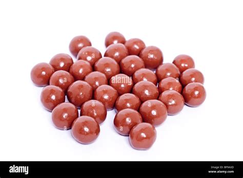 Chocolate maltesers on a white background Stock Photo - Alamy