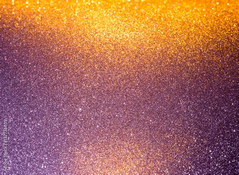 Abstract background filled with shiny gold and purple glitter Stock ...