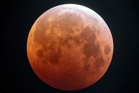 Views of Wednesday Morning's Amazing Total Lunar Eclipse from Around the World