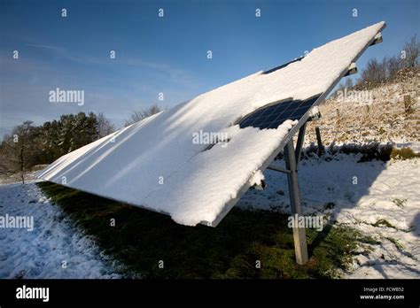 Snow covered solar panels, Northumberland Stock Photo - Alamy