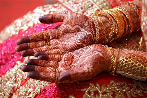 Bride Showing Mehndi in Hands Stock Photo - Image of beautiful, earring ...