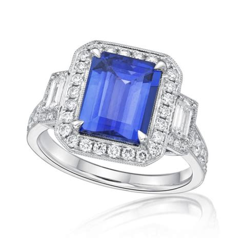 Exceptional Emerald Cut Tanzanite & Diamond Ring